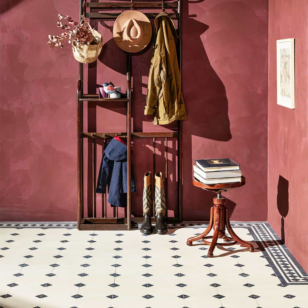 Anthropology Black tile featuring soft ivory tones with charcoal corner accents, ideal for modern interiors, offering a timeless geometric pattern for floors and walls.