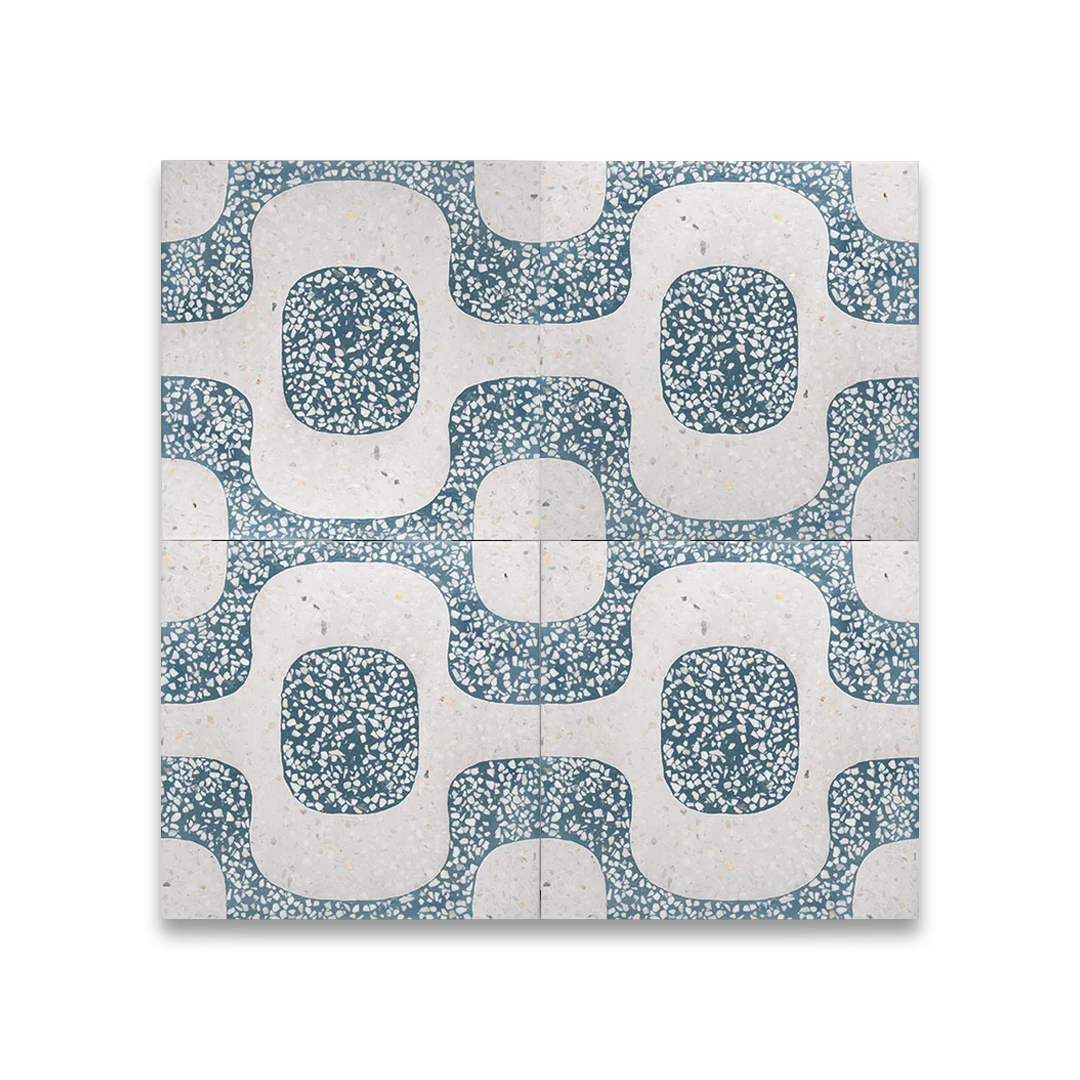 Cement tile featuring a terrazzo pattern with curved geometric shapes in teal blue and white tones, matte finish, ideal for retro, Mediterranean, or modern interior flooring and wall décor applications.