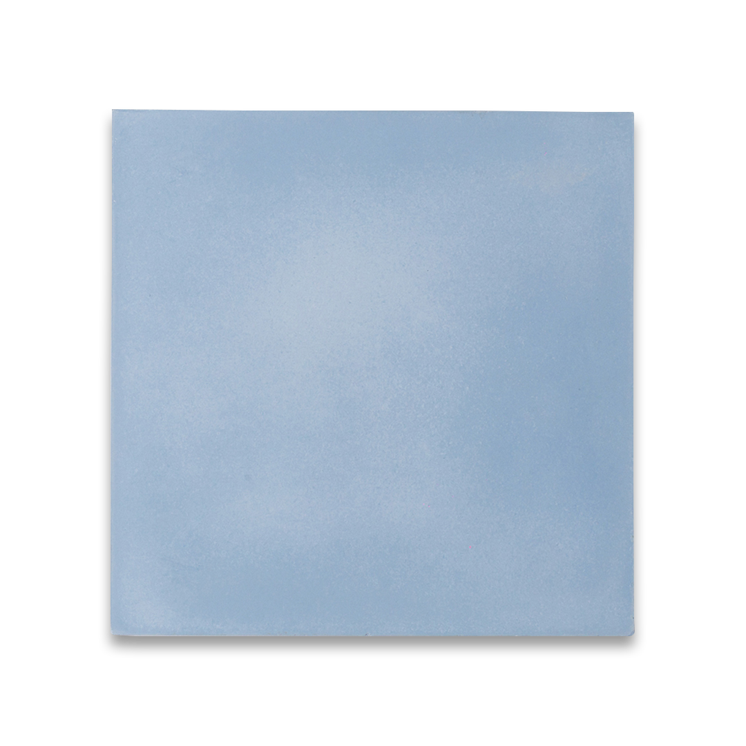 Cement tile featuring a solid pastel sky blue color with a smooth matte finish, handcrafted surface, ideal for coastal, Scandinavian, or contemporary interior flooring and wall décor applications.