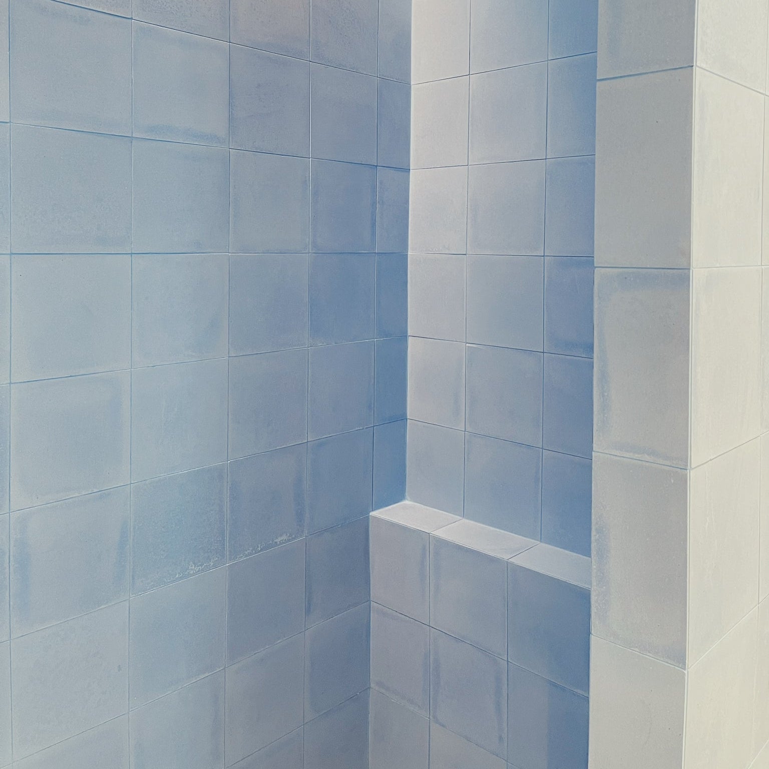 Cement tile featuring a solid pastel sky blue color with a smooth matte finish, handcrafted surface, ideal for coastal, Scandinavian, or contemporary interior flooring and wall décor applications.