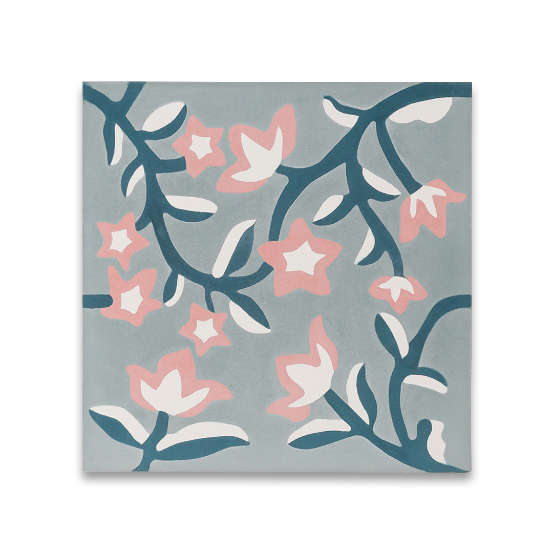 Cement tile featuring a floral pattern with pink and white blossoms on dark teal vines over a soft gray background, matte finish, ideal for vintage, bohemian, or Mediterranean interiors.