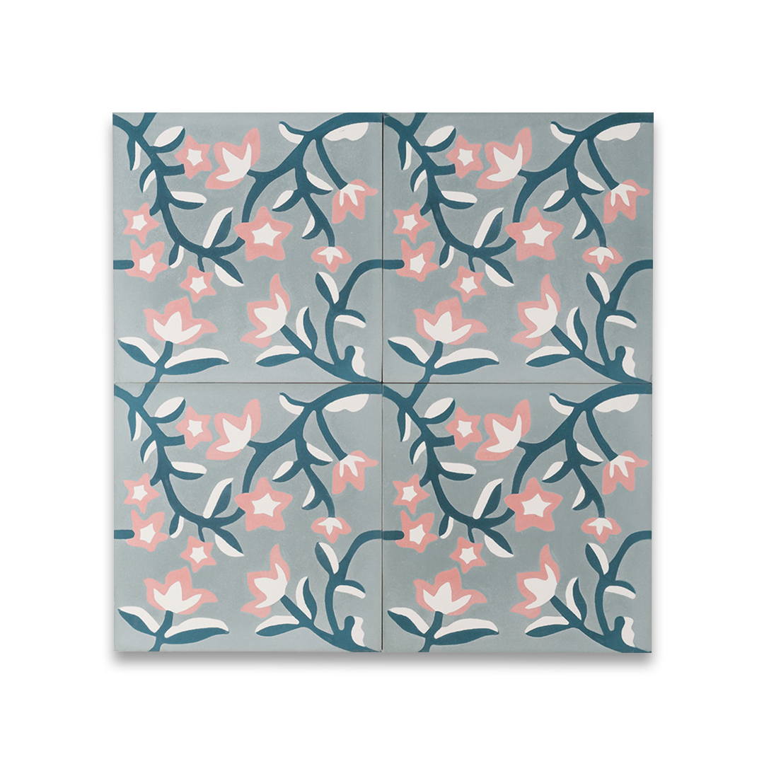 Cement tile featuring a floral pattern with pink and white blossoms on dark teal vines over a soft gray background, matte finish, ideal for vintage, bohemian, or Mediterranean interiors.