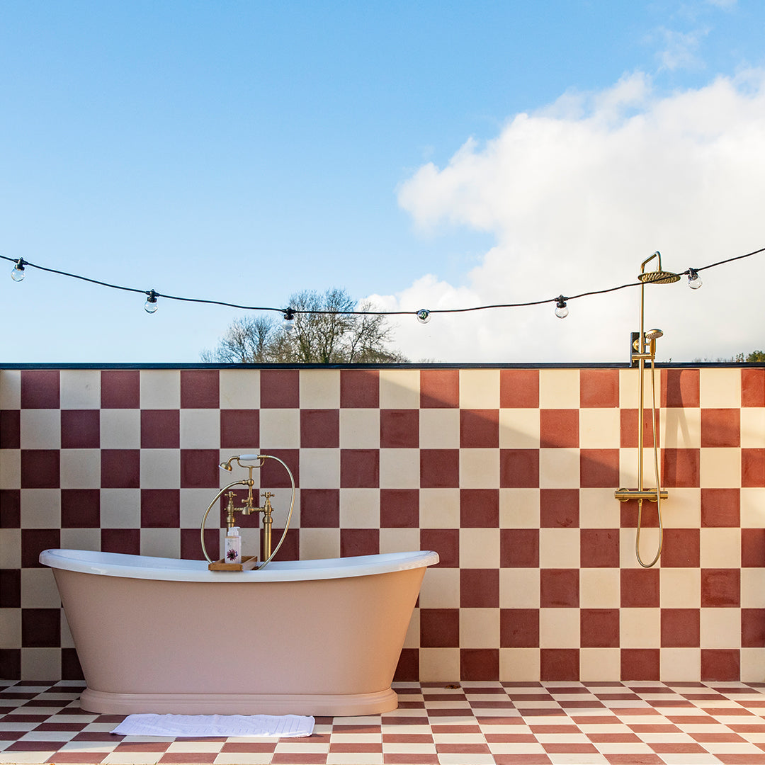 Cement tile featuring a solid burgundy red color with a smooth matte finish, handcrafted surface, ideal for rustic, industrial, or Mediterranean interior flooring and wall décor applications.