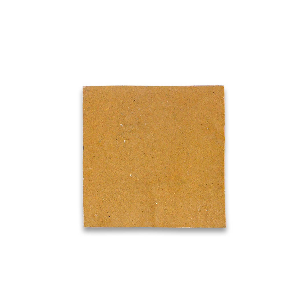 Square piece of brown cardboard on a white background