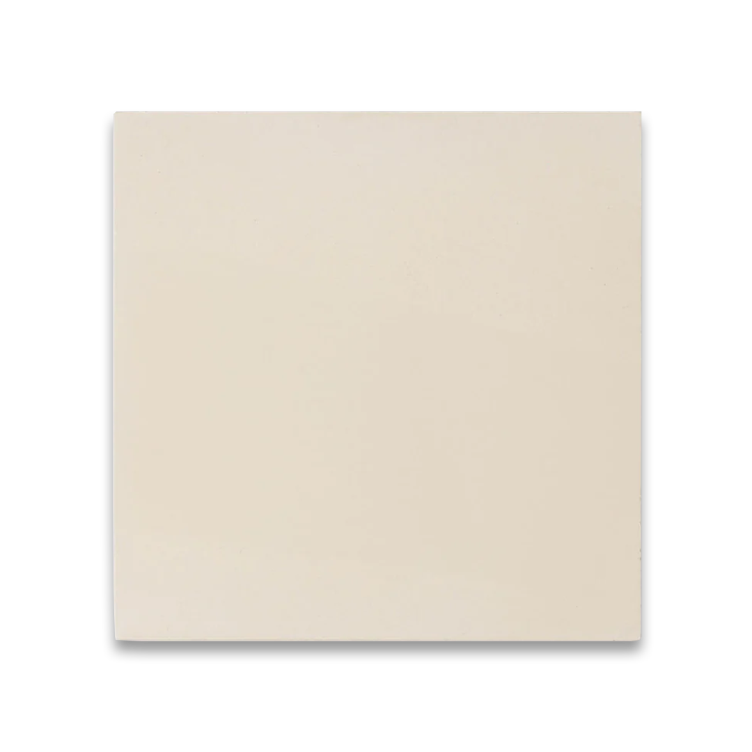 Ivory-colored cement tile with a smooth matte finish and subtle warm undertones, ideal for minimalist, contemporary, or Mediterranean-style flooring and wall design applications.