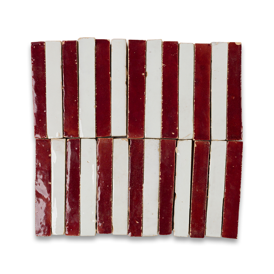 Set of red and white striped tiles on a white background