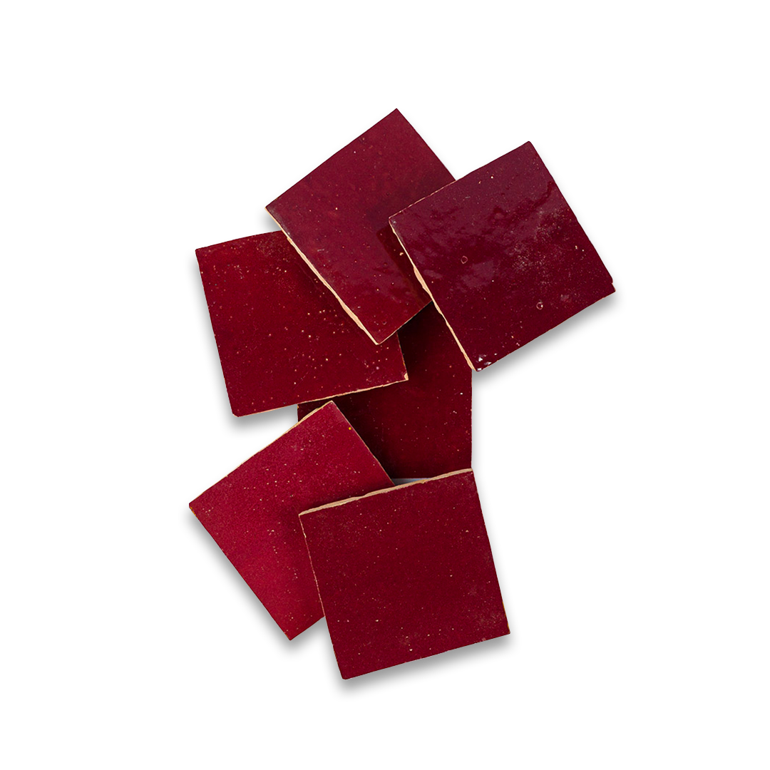 Set of six red square tiles on a white background