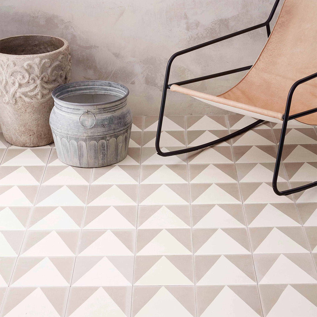 Beige and cream cement tile featuring a minimalist triangular peak design, ideal for modern interiors, geometric wall layouts, or contemporary patterned floor installations.
