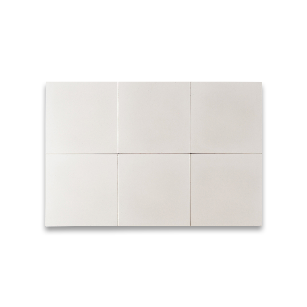 Pure white cement tiles with a smooth matte finish, reflecting minimalist elegance and durability. Ideal for modern interiors, flooring, and wall designs with a clean aesthetic.