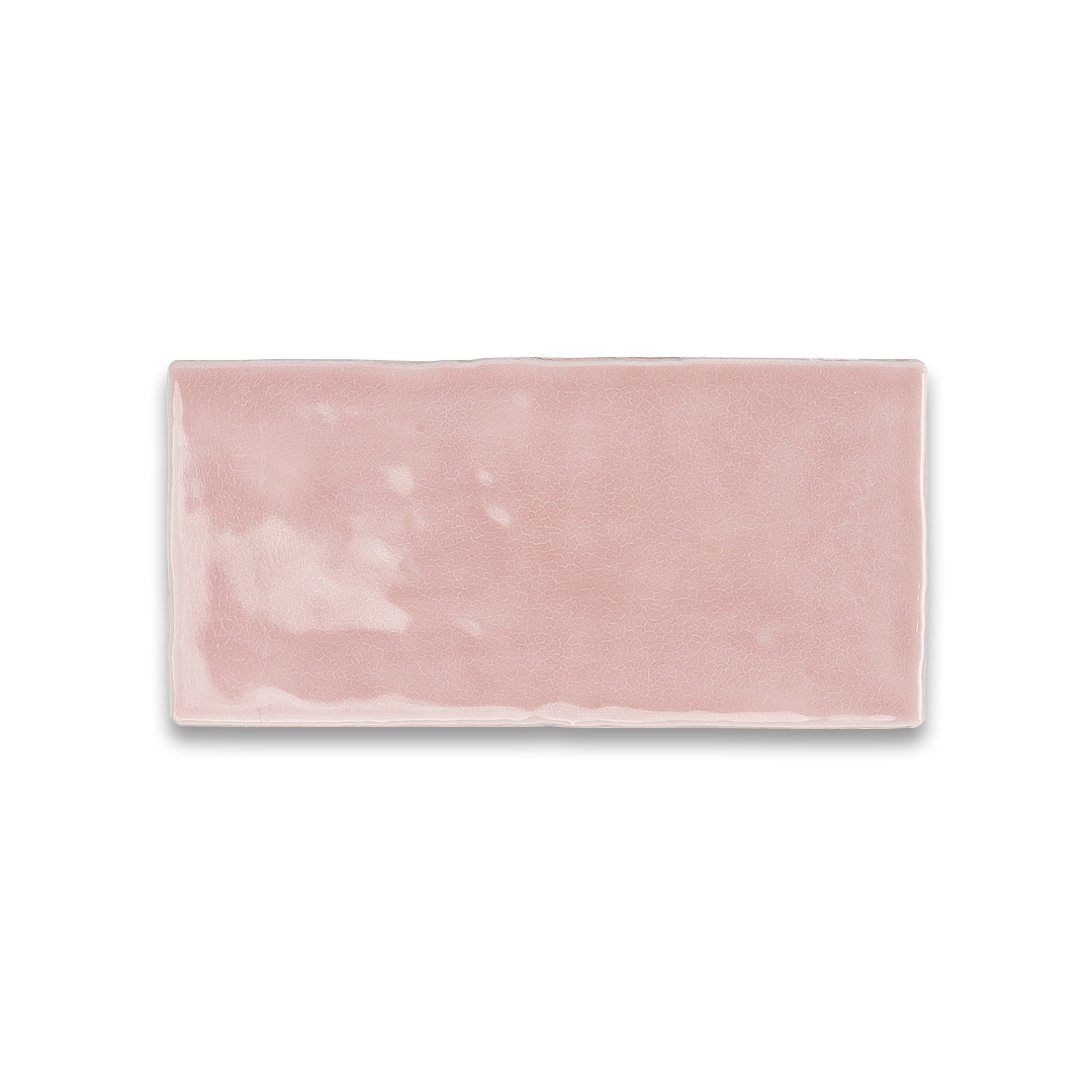 Rectangular pink tile with a white border on a white background