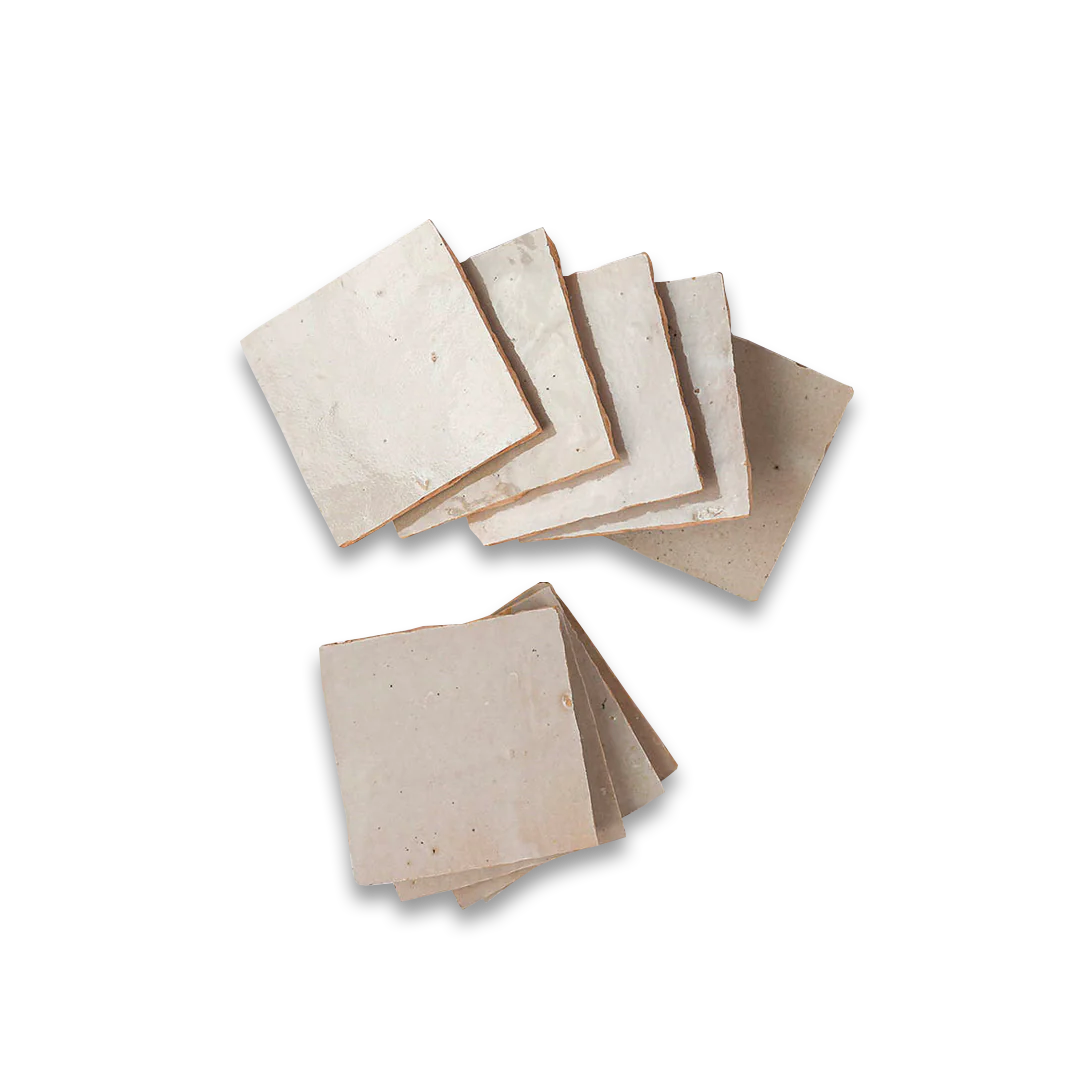 Set of square stone coasters on a white background