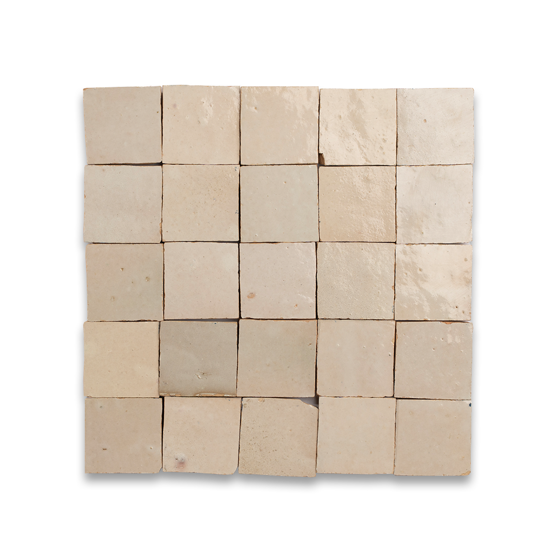 Square mosaic tile pattern made of beige stone on a white background