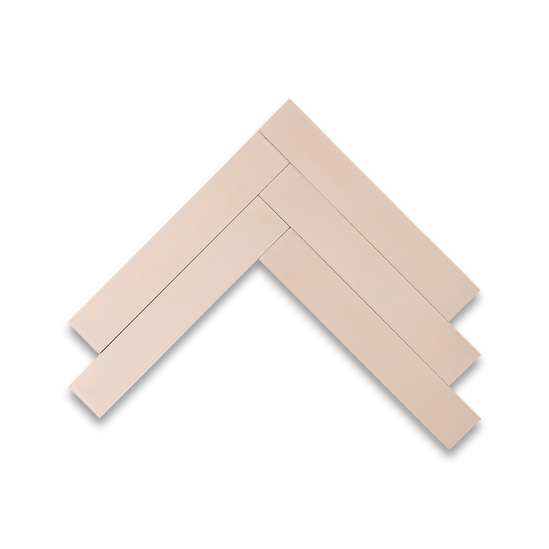 Egg Shell Herringbone cement tile arrangement featuring elongated rectangular tiles in a soft beige tone, smooth matte finish, minimalist modern design ideal for contemporary flooring, wall cladding, and interior décor applications.