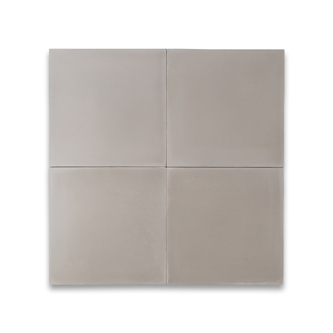 A solid light gray color with a smooth matte finish, square shape, ideal for modern, minimalist, or industrial interior flooring and wall design applications.