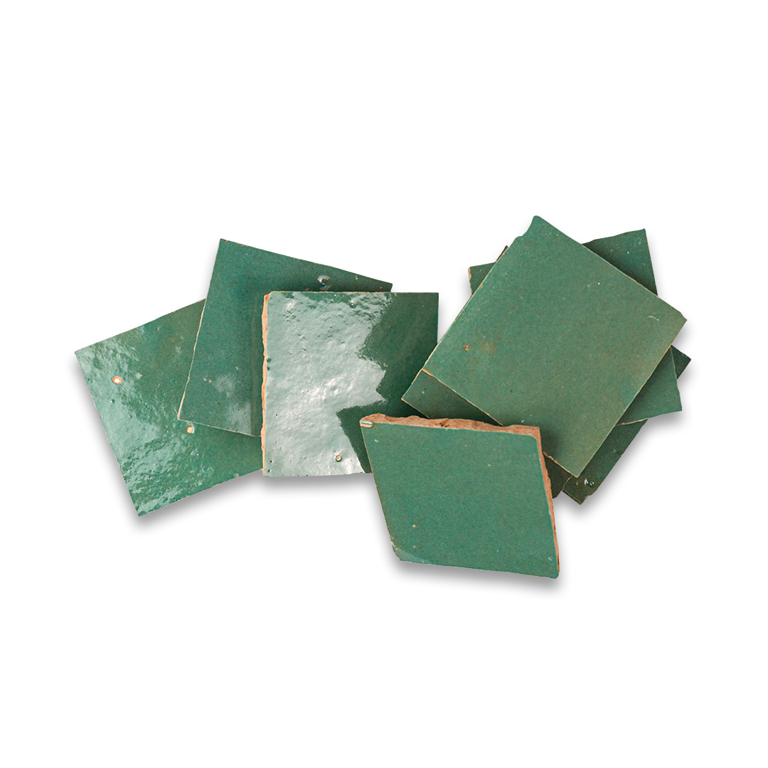 Collection of green square tiles on a white background