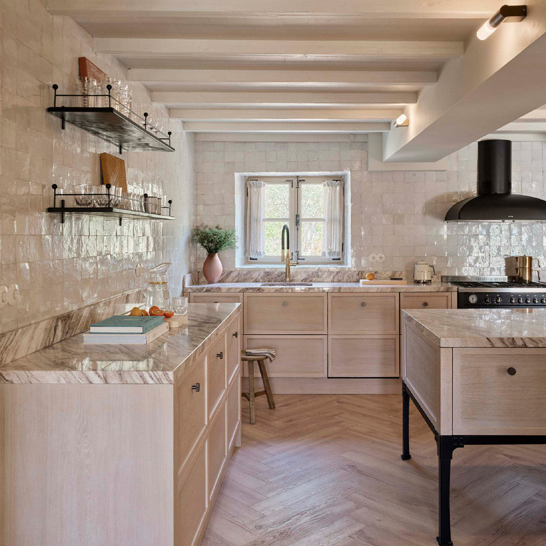 Modern kitchen with wooden floors and white walls