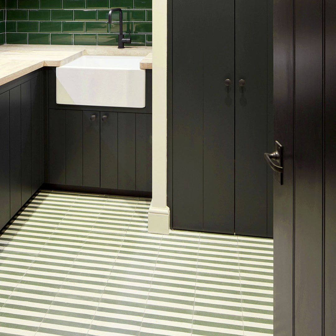 An alternating vertical green and white stripes with a matte finish, ideal for modern, retro, or Mediterranean interior flooring, wall décor, and accent design applications.