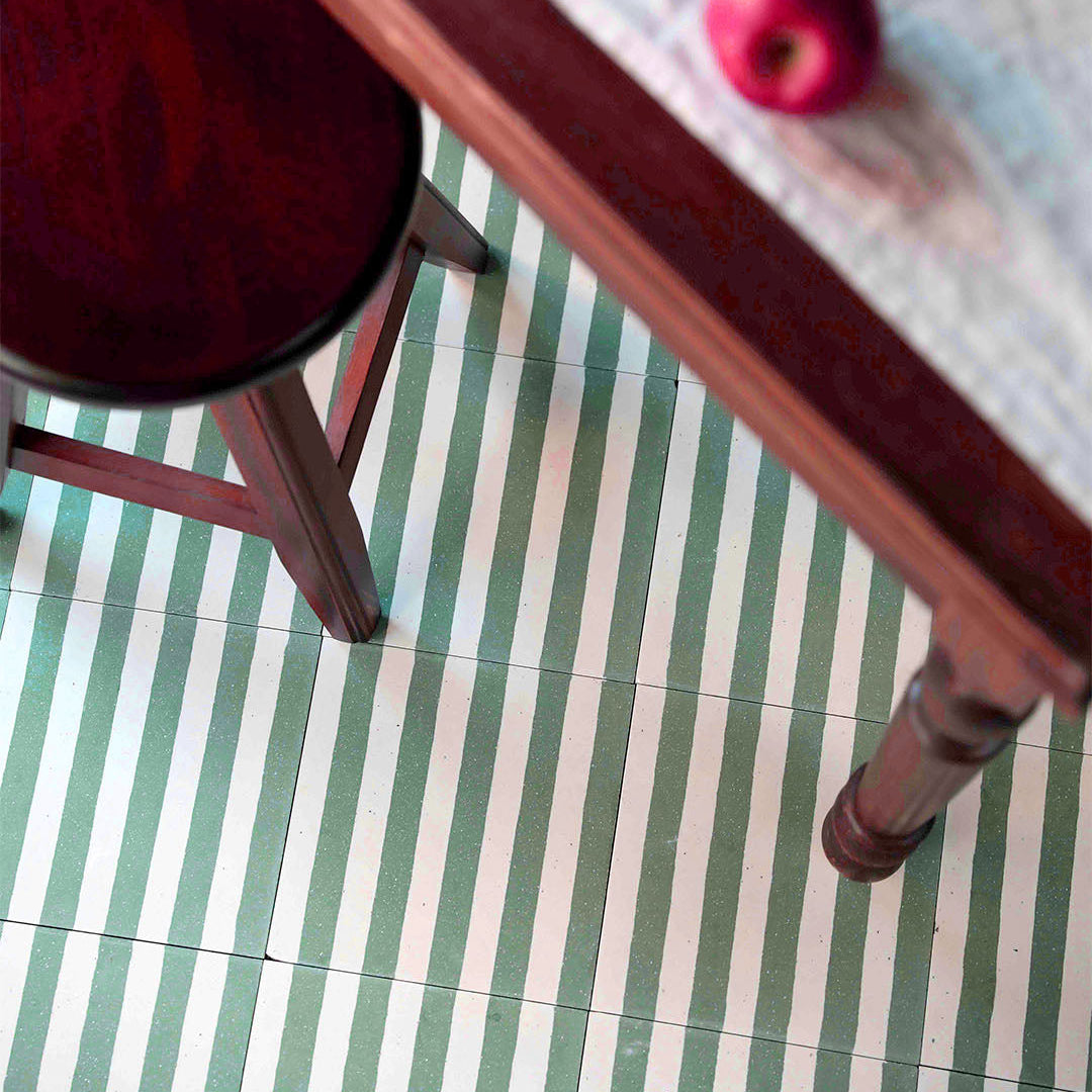 An alternating vertical green and white stripes with a matte finish, ideal for modern, retro, or Mediterranean interior flooring, wall décor, and accent design applications.