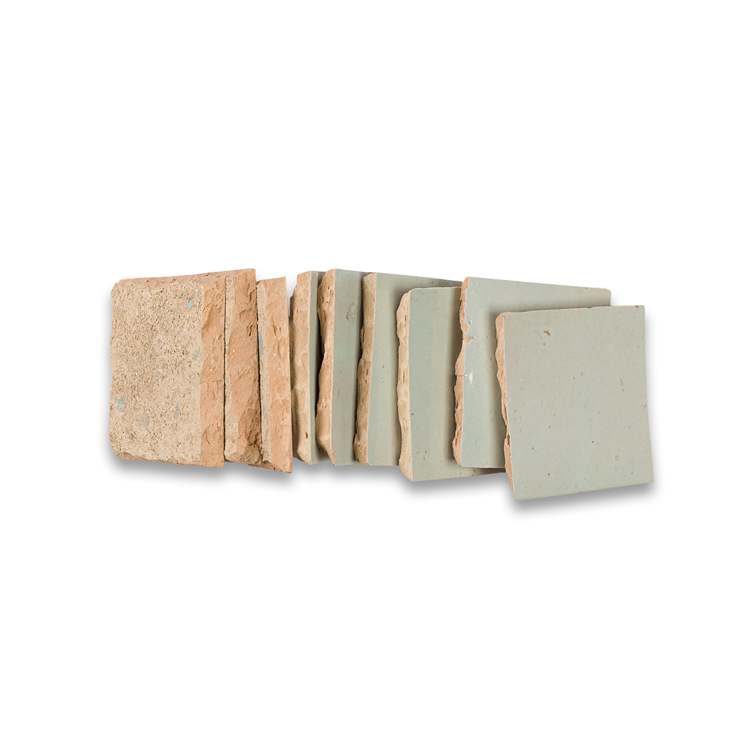 Set of stone-like coasters with natural patterns on a white background