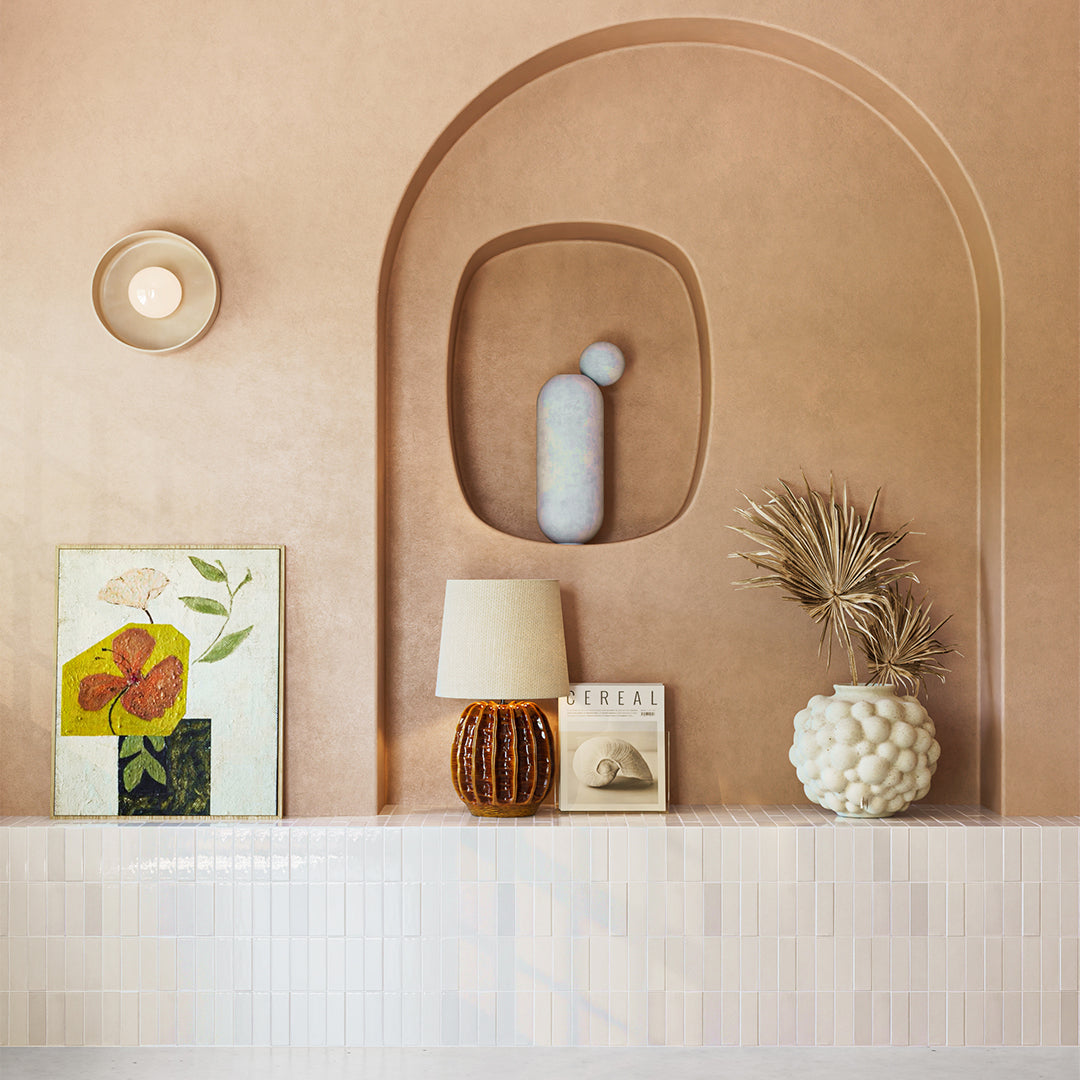 White ceramic bathroom tiles arranged in clean grid pattern, ideal for flooring, backsplash, or shower walls.