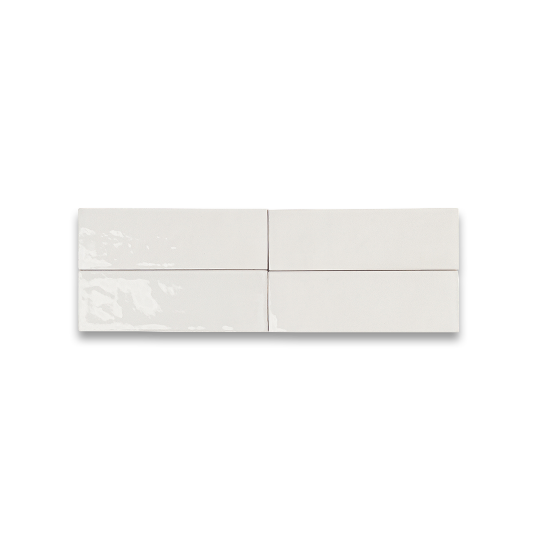 White ceramic bathroom tiles arranged in clean grid pattern, ideal for flooring, backsplash, or shower walls.