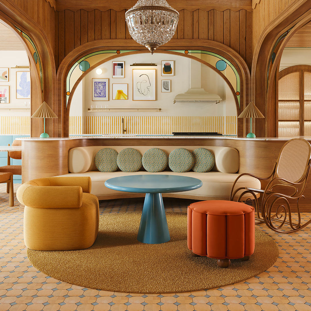 Luxurious interior with a chandelier, wooden furniture, and decorative elements.