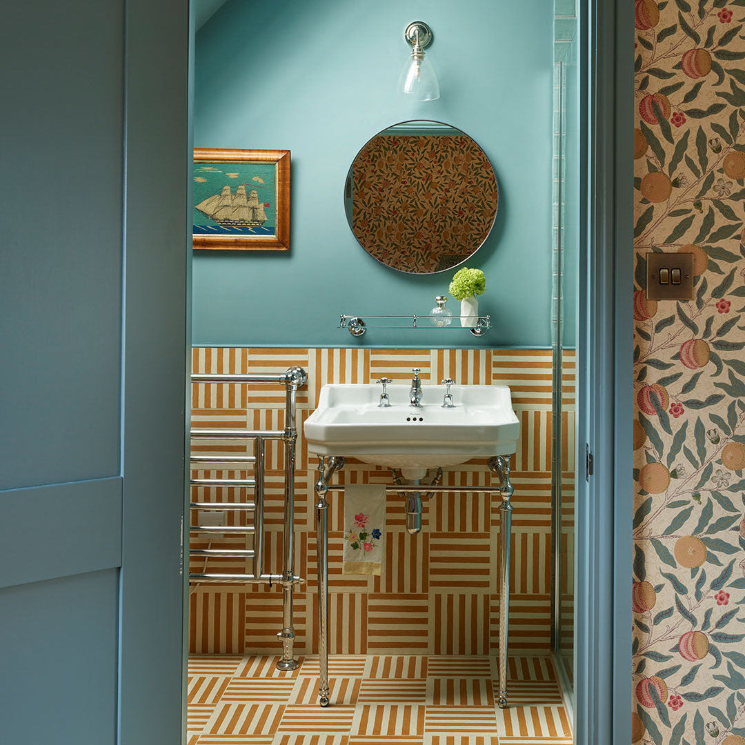 Cement tile featuring alternating vertical stripes in warm ochre orange and white, matte finish, handcrafted surface, ideal for Mediterranean, coastal, or contemporary interior flooring and wall décor applications.