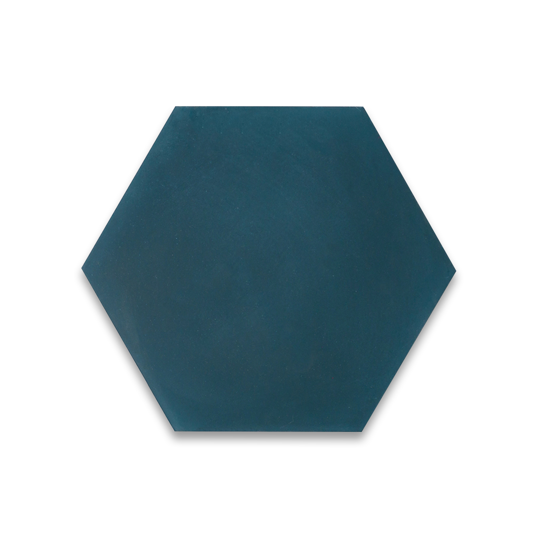 Cement tile featuring a solid deep teal blue hexagonal design with a smooth matte finish, handcrafted surface, ideal for modern, geometric, or Mediterranean interior flooring and wall décor applications.