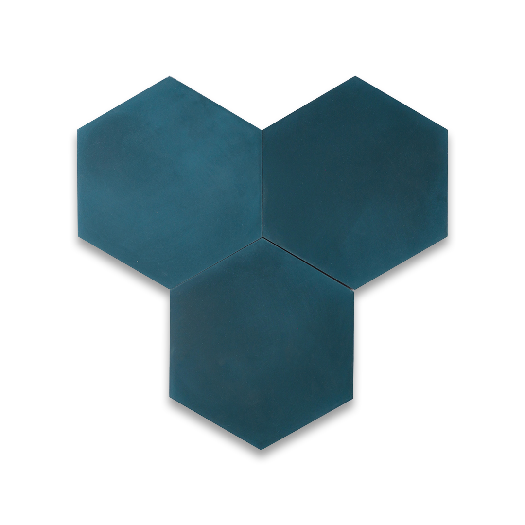 Cement tile featuring a solid deep teal blue hexagonal design with a smooth matte finish, handcrafted surface, ideal for modern, geometric, or Mediterranean interior flooring and wall décor applications.