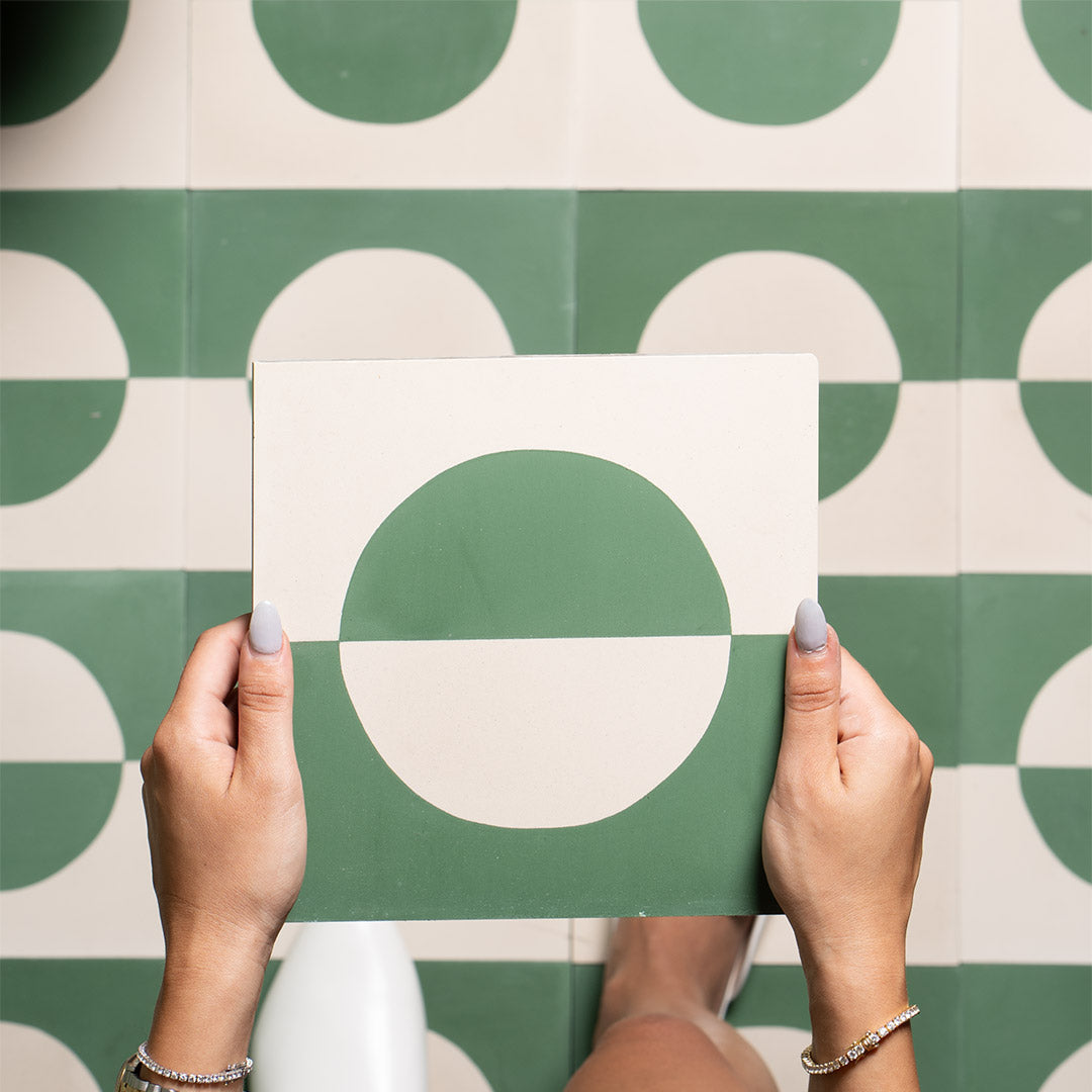 A geometric circle pattern in sage green and off-white, matte finish, ideal for modern, minimalist, or contemporary interior flooring and wall décor applications.