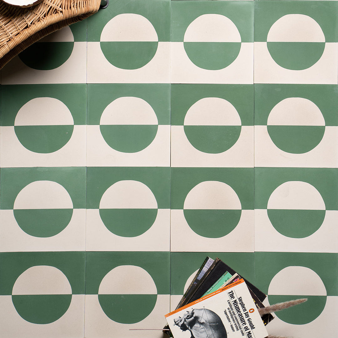 A geometric circle pattern in sage green and off-white, matte finish, ideal for modern, minimalist, or contemporary interior flooring and wall décor applications.