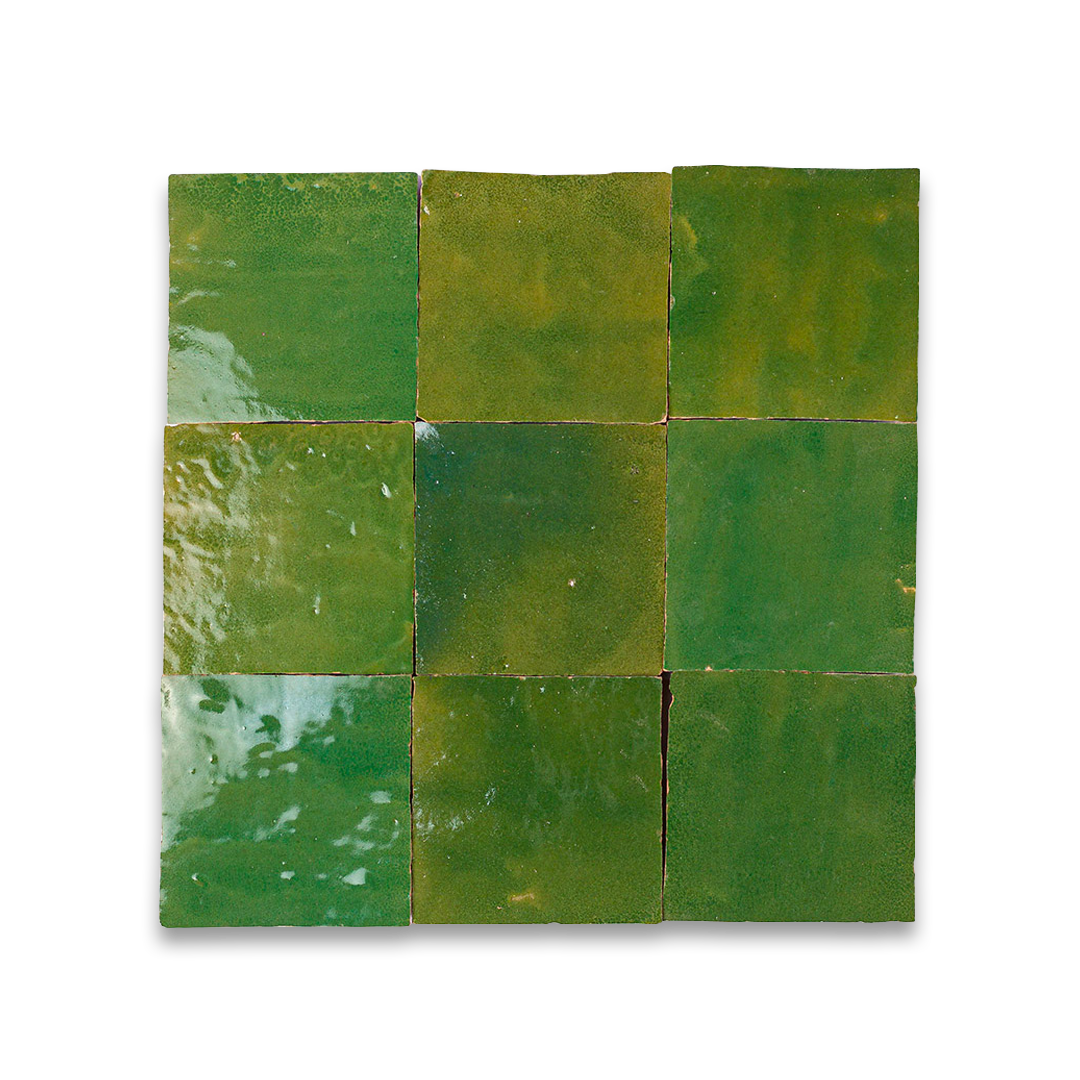 Square tile with green mosaic pattern on a white background