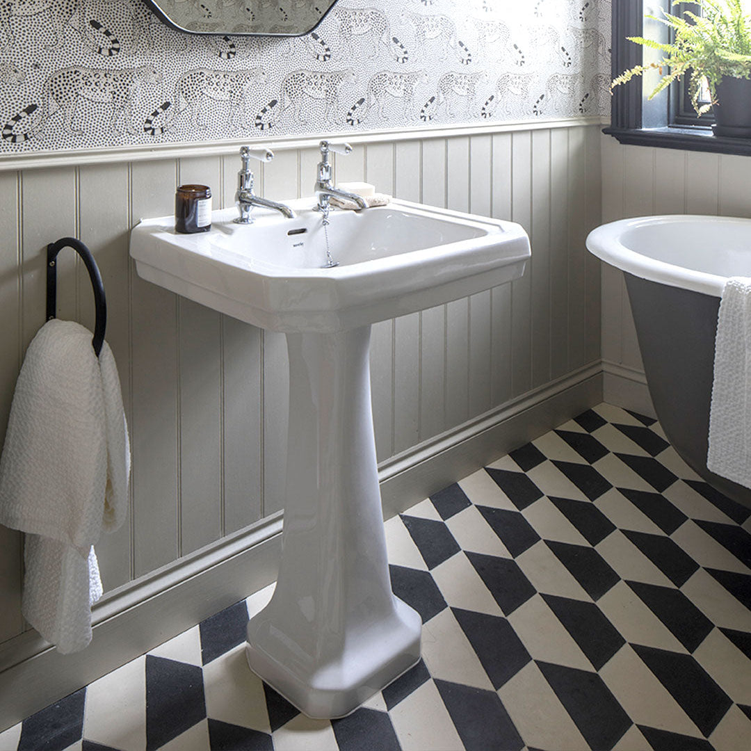 Geometric hexagonal tile featuring a bold black upper section and soft cream lower half, ideal for modern interiors, 3D wall illusions, or contemporary floor patterns.