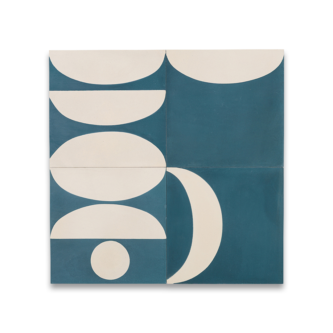 Cement tile featuring abstract geometric shapes in deep teal blue and white, with curved and circular patterns, matte finish, ideal for modern, retro, or mid-century interior flooring and wall décor applications.