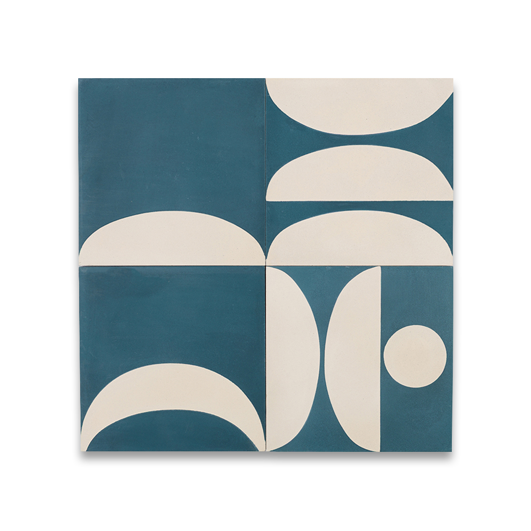 Cement tile featuring abstract geometric shapes in deep teal blue and white, with curved and circular patterns, matte finish, ideal for modern, retro, or mid-century interior flooring and wall décor applications.