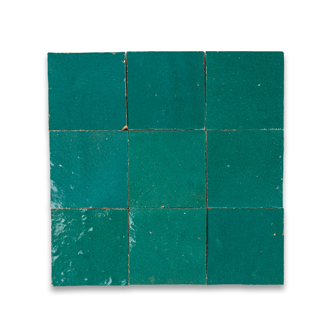 Green tile with a grid pattern on a white background