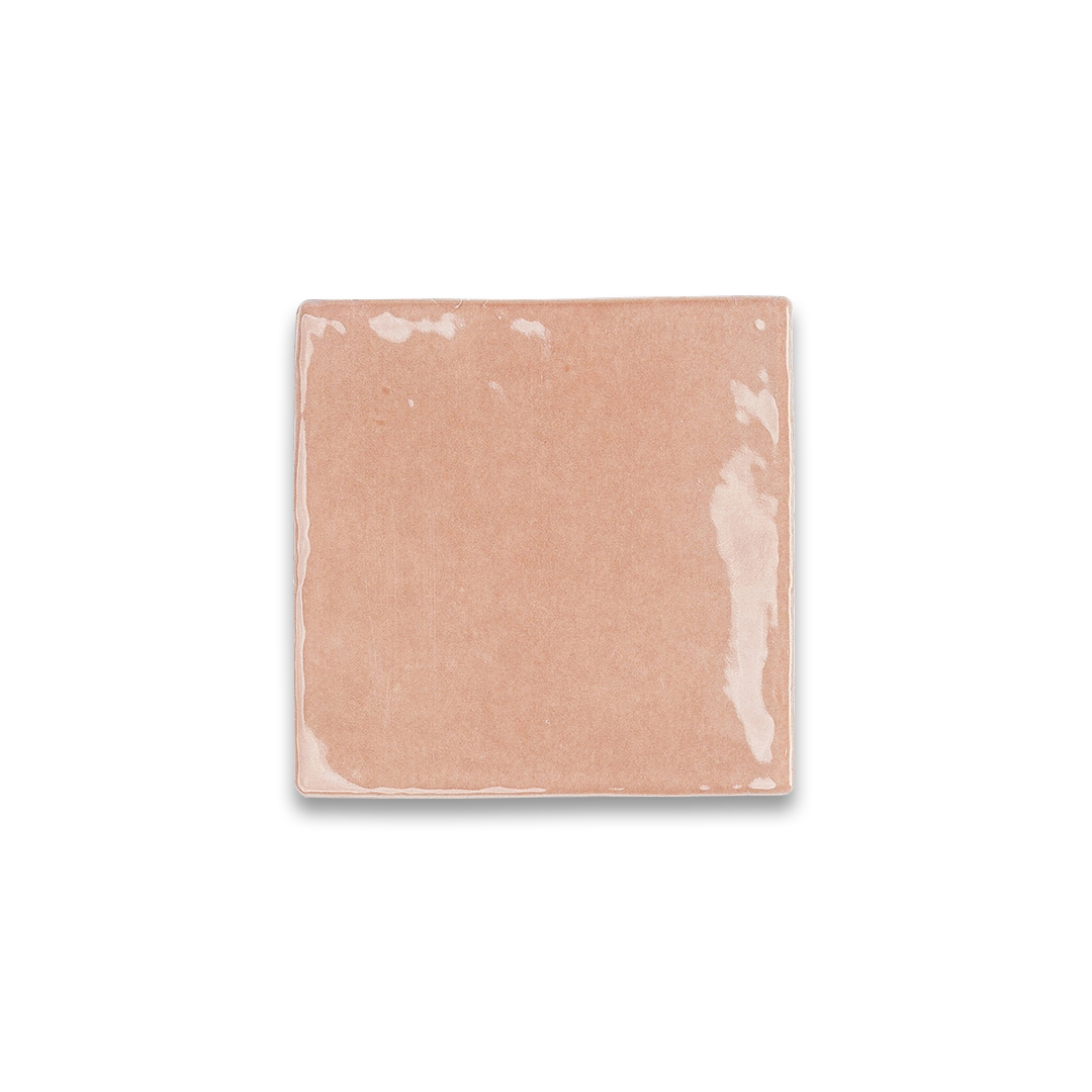 Square beige color swatch with white patches on a white background