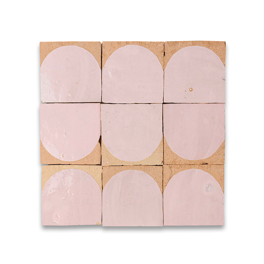 Pink oval tiles on a cardboard backing