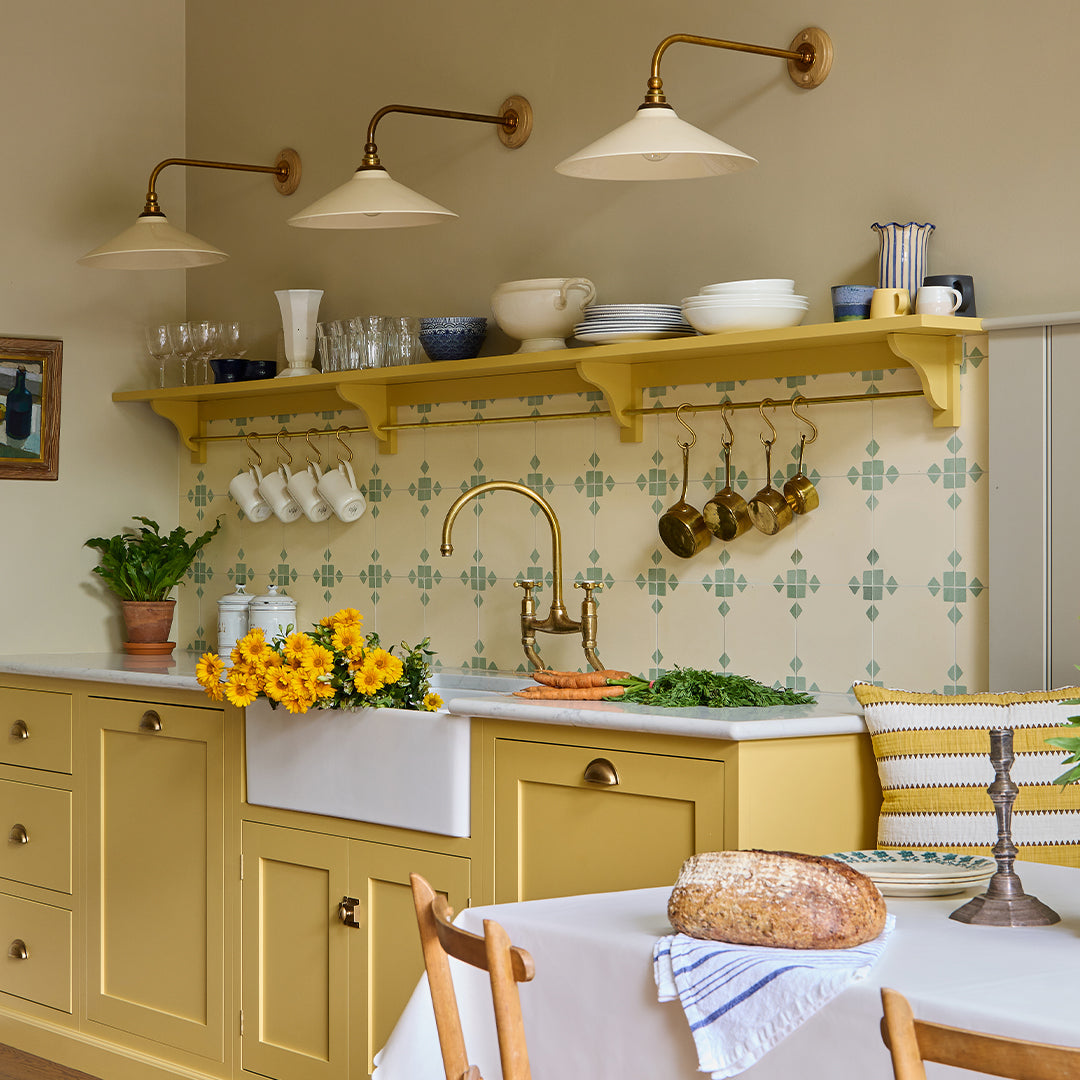 Contemporary cement tile featuring a soft beige base with subtle sage green corner accents, ideal for minimalist interiors, geometric wall layouts, or modern floor designs.