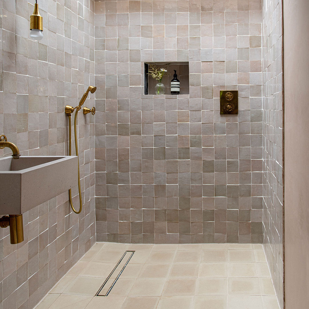 Matte beige tile with a smooth, uniform surface and soft neutral tone, ideal for minimalist interiors, modern wall cladding, or contemporary floor designs.