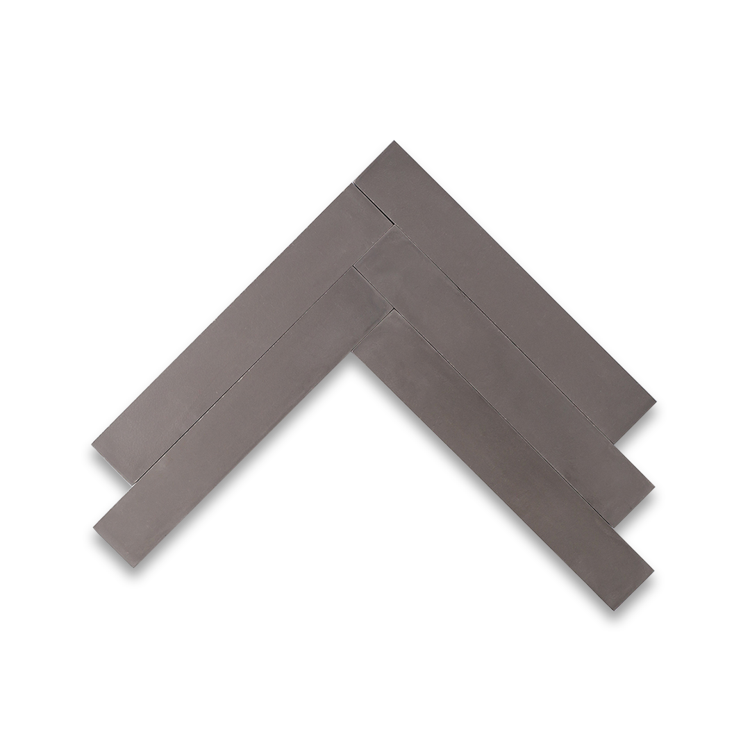 A chevron pattern in dark gray with a smooth matte finish, rectangular shape, ideal for modern, industrial, or minimalist flooring and wall design applications.