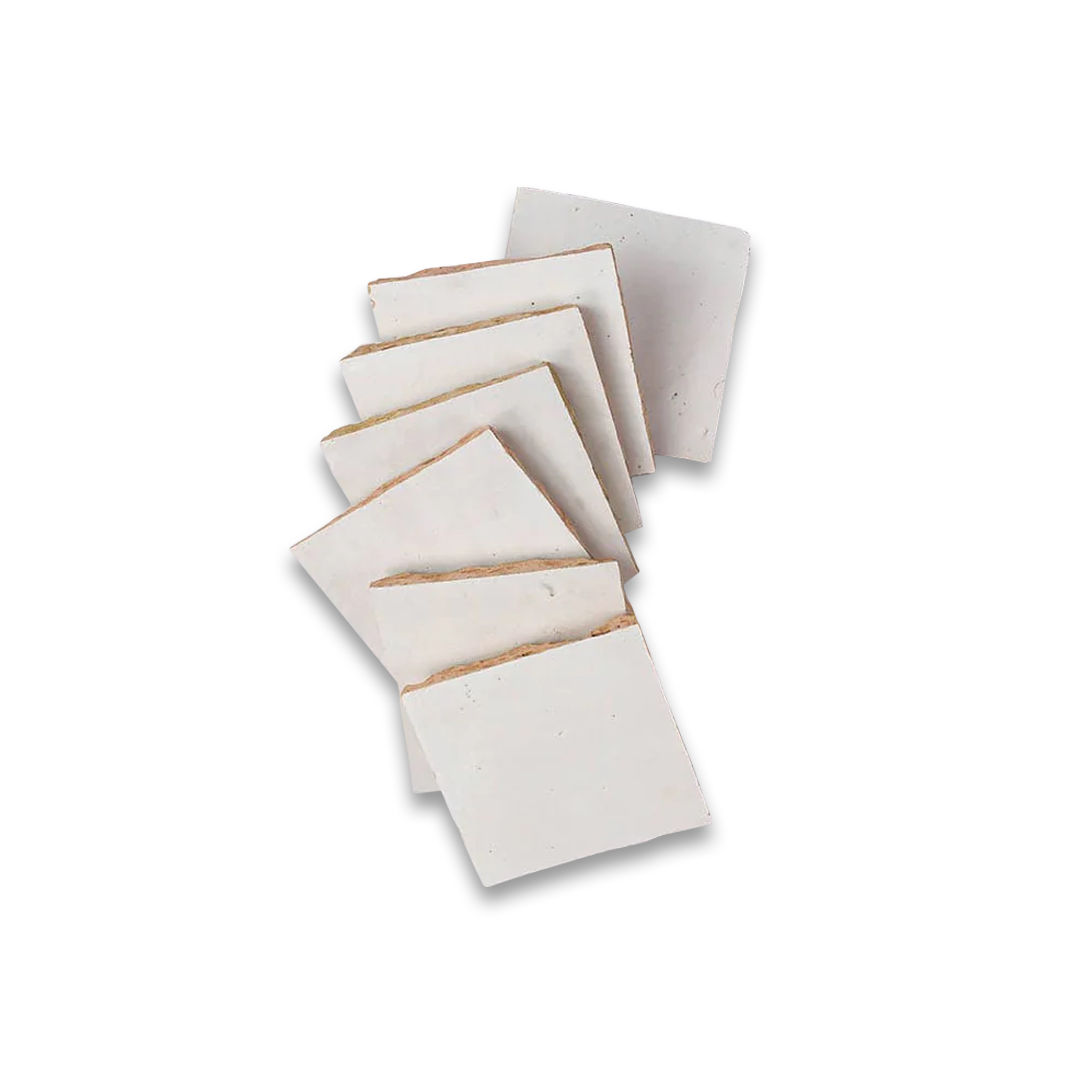 Set of six square ceramic coasters on a white background.