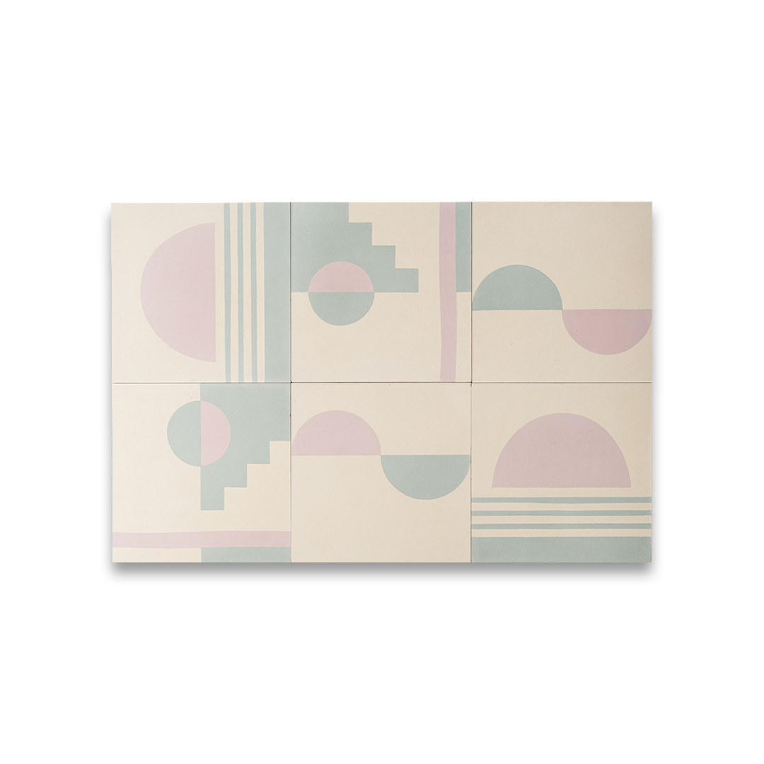 Surfside tile design featuring geometric patterns in pastel blue and mauve on a cream background, with semicircles, stripes, and stair-step shapes creating a modern coastal aesthetic.