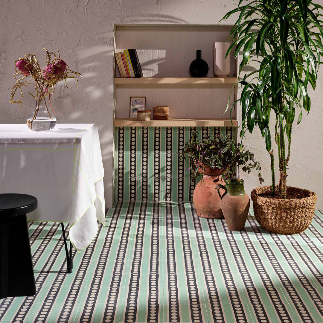 An alternating mint green and black vertical stripes with white polka dots, matte finish, ideal for retro, modern, or geometric interior flooring and wall décor applications.