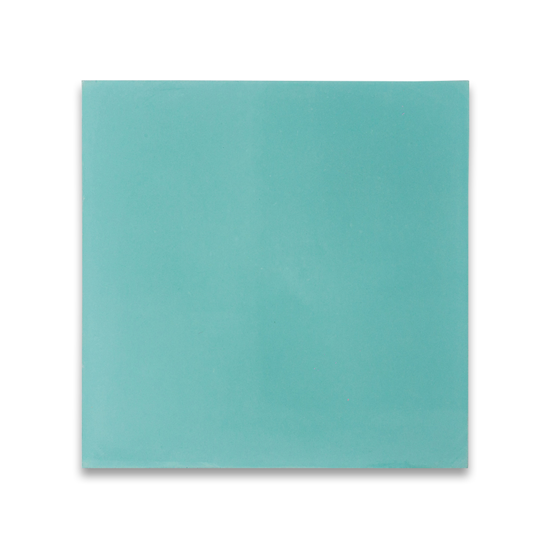 Cement tile featuring a solid teal blue color with a smooth matte finish, ideal for minimalist, modern, or coastal interior flooring, wall cladding, and decorative design applications.