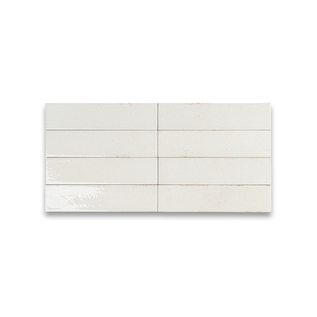 Glossy white ceramic bathroom tiles with subtle speckled texture, perfect for modern flooring, backsplash, or shower walls