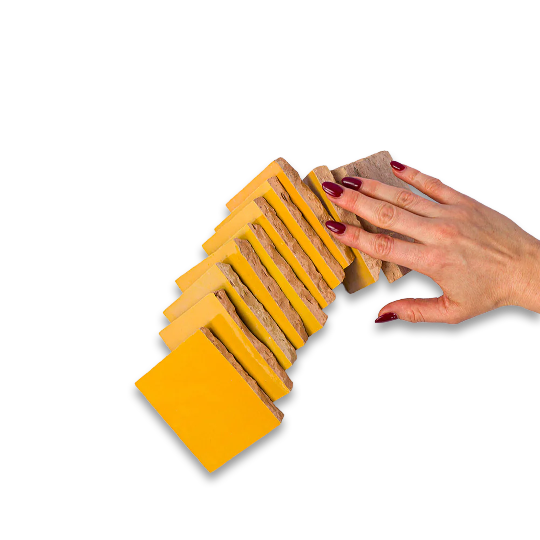 Hand interacting with a set of wooden blocks on a white background