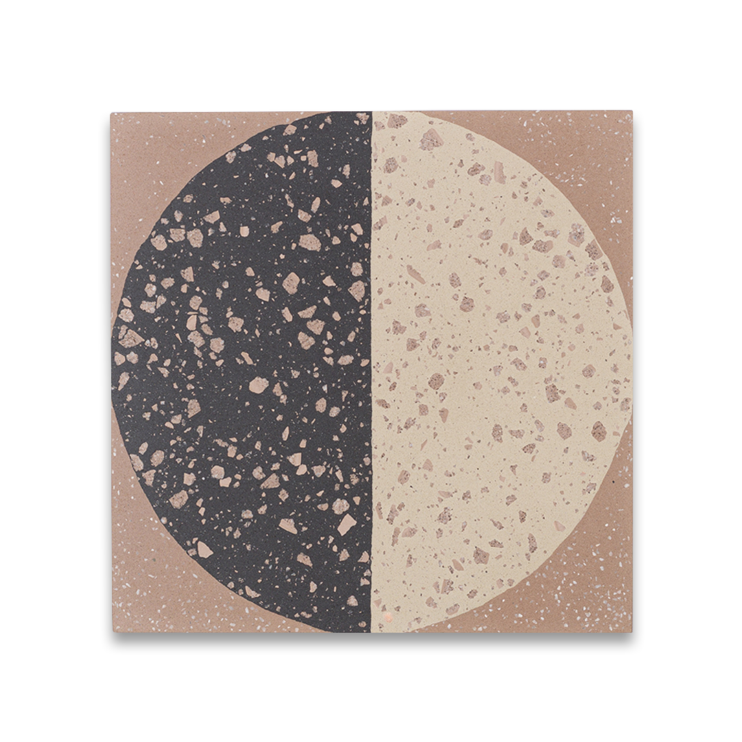 A square cement tile featuring a large circle divided into black and beige halves with terrazzo speckles, set against a warm brown background for a modern geometric look.