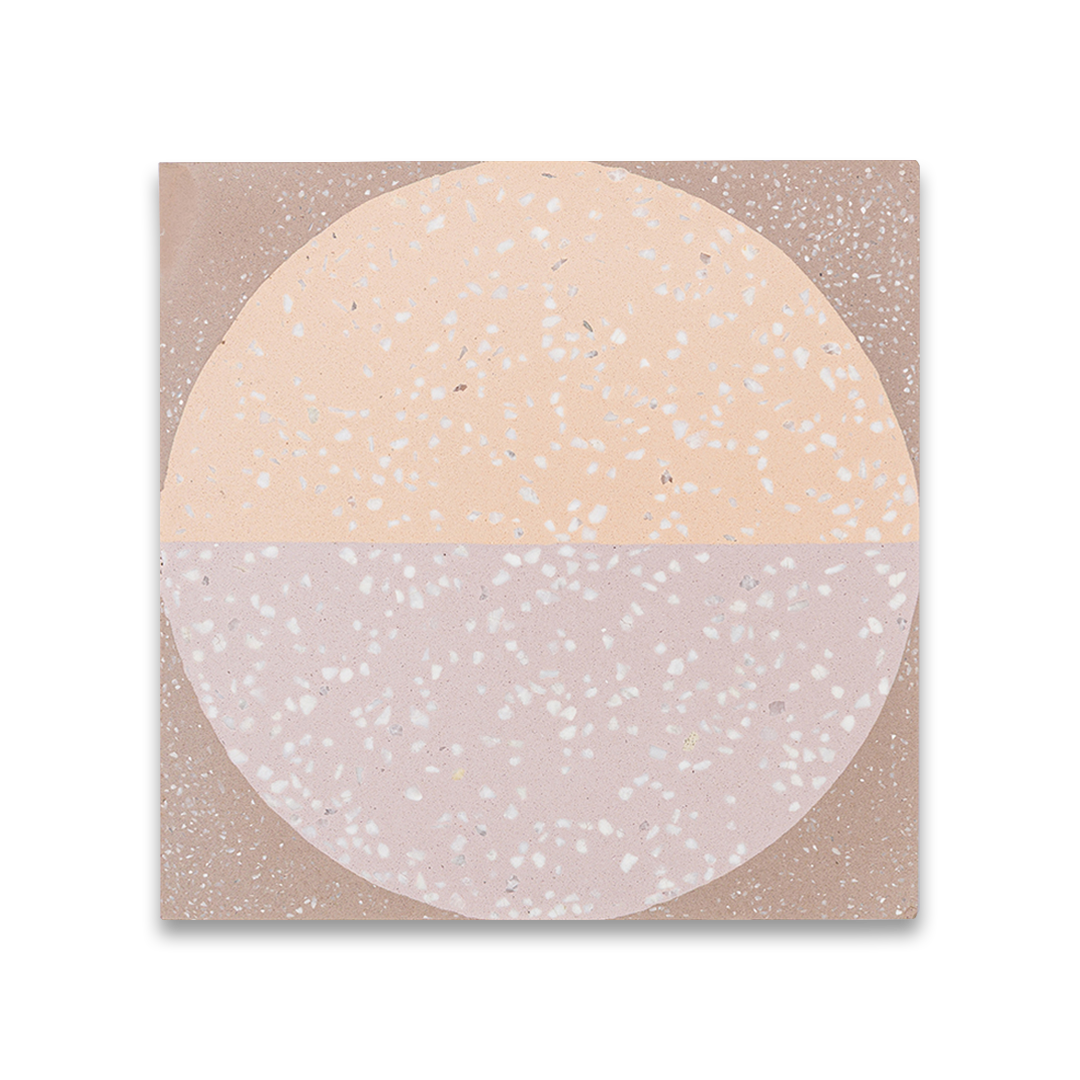 A square cement tile featuring a large circle divided into peach and mauve halves with white terrazzo speckles, set against a taupe background for a modern geometric look.