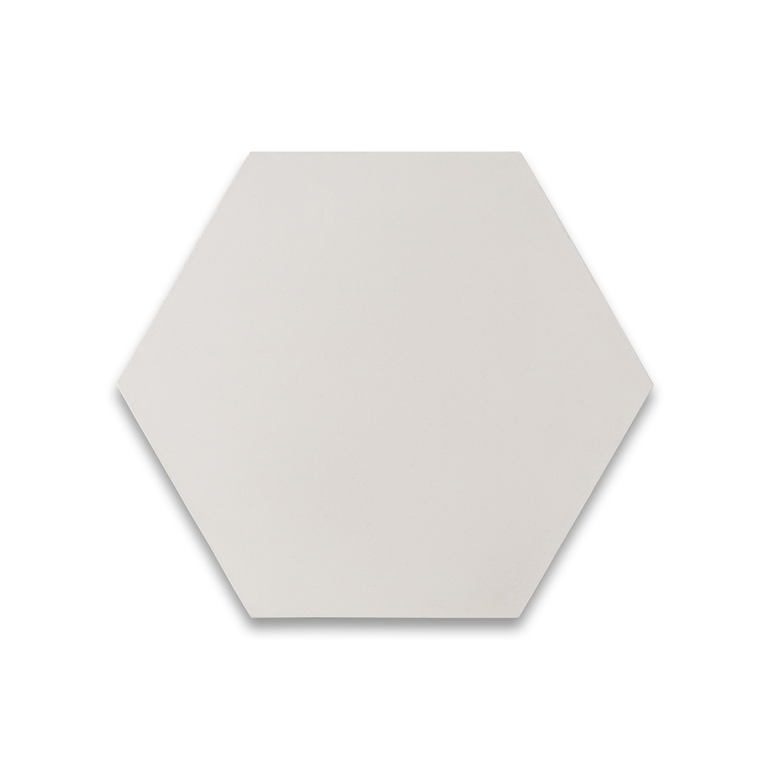 Pure white hexagonal cement tile with a smooth matte surface, showcasing minimalist geometric design ideal for modern flooring, wall cladding, and contemporary interior aesthetics.